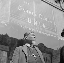 A follower of the late Marcus Garvey who started the "Back to Africa" movement, New York, 1943. Creator: Gordon Parks