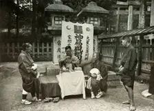 A Fortune-Teller at Inari Temple 1910. Creator: Herbert Ponting