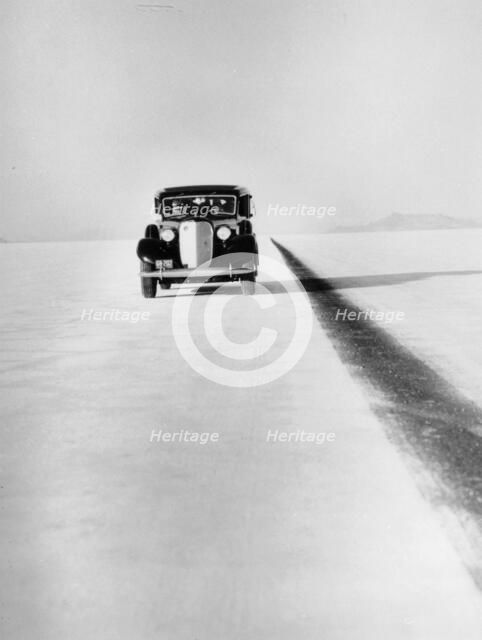 A Ford Lincoln on the Bonneville Salt Flats, Utah, 1935. Creator: Unknown.