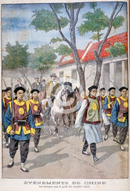 A foreigner under the guard of regular Chinese army, China, 1900.  Artist: Oswaldo Tofani