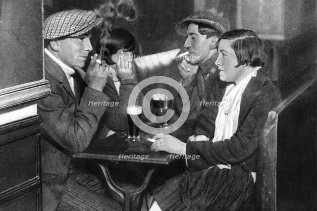 A foursome in a bal-musette, Paris, 1931. Artist: Ernest Flammarion