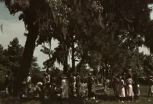 A Fourth of July celebration by a group of Negroes, St. Helena Island, S.C., 1939. Creator: Marion Post Wolcott