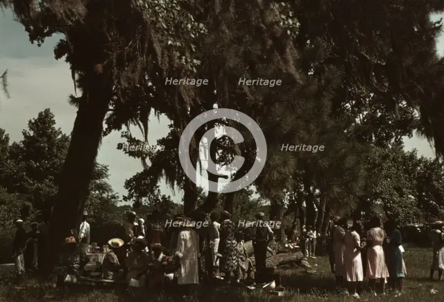 A Fourth of July celebration by a group of Negroes, St. Helena Island, S.C., 1939. Creator: Marion Post Wolcott.