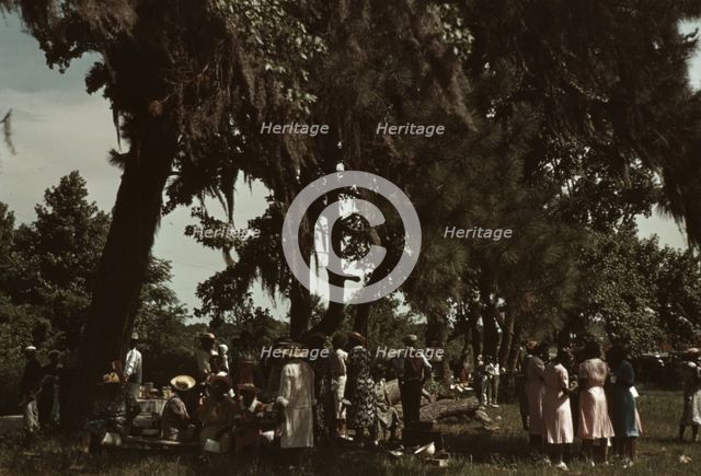 A Fourth of July celebration by a group of Negroes, St. Helena Island, S.C., 1939. Creator: Marion Post Wolcott.