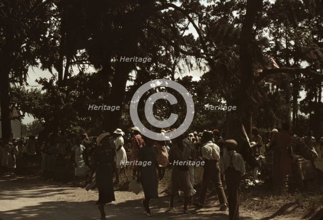 A Fourth of July celebration by a group of Negroes, St. Helena Island, S.C., 1939. Creator: Marion Post Wolcott.