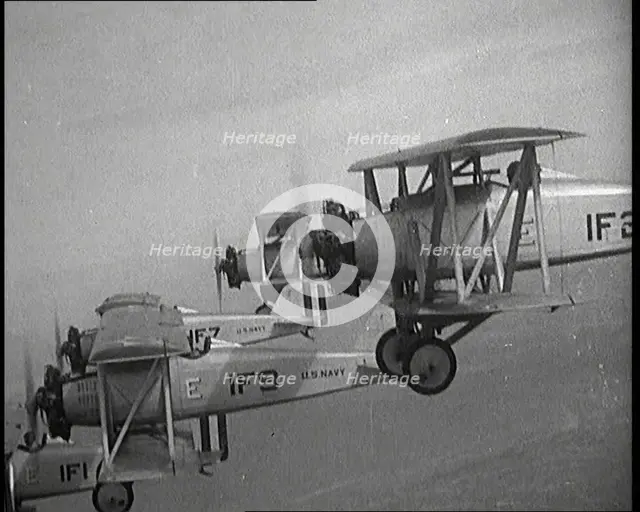 A Fleet of US Fighter Planes Mid Flight, 1920s. Creator: British Pathe Ltd.