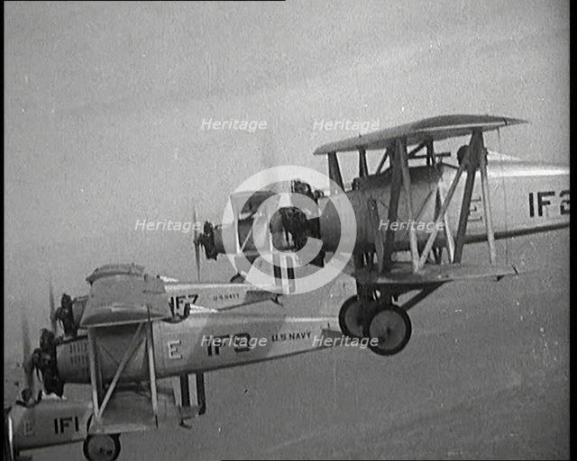 A Fleet of US Fighter Planes Mid Flight, 1920s. Creator: British Pathe Ltd.