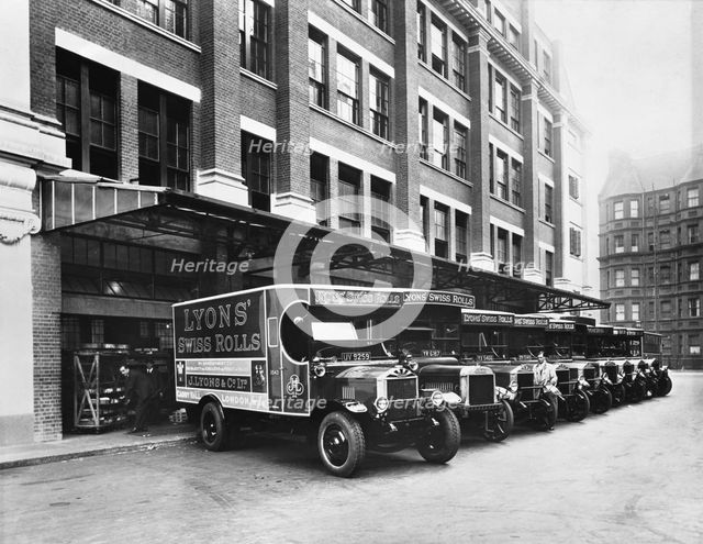 A fleet of Lyons delivery vans, Cadby Hall, West Kensington, London. Creator: Unknown.