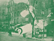 A French aeroplane descends in a Paris street, c1917 (1919)