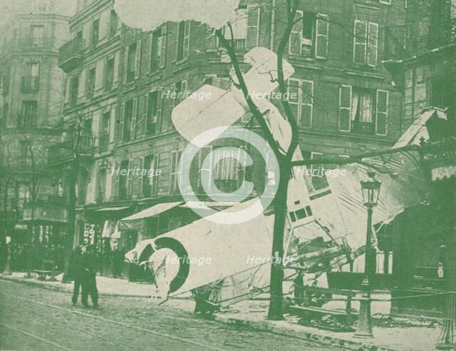 A French aeroplane descends in a Paris street, c1917 (1919). Artist: Unknown.