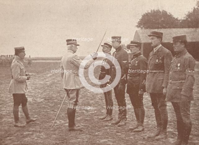 A French General conferring decorations on aviators, c1918 (1919). Artist: Unknown.