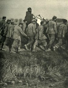 A French North African soldier with prisoners or war, First World War, 1914, (c1920). Creator: Unknown