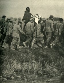 A French North African soldier with prisoners or war, First World War, 1914, (c1920). Creator: Unknown