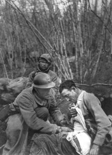 A French soldier's wounds are treated, World War I, France, 1916