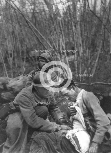 A French soldier's wounds are treated, World War I, France, 1916. Artist: Unknown
