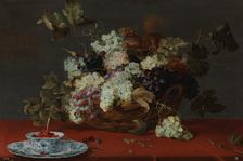 A fruit still life with a basket of grapes and a squirrel on a table, between 1600 and 1657. Creator: Frans Snyders