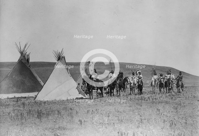 A gathering war party, c1908. Creator: Edward Sheriff Curtis.