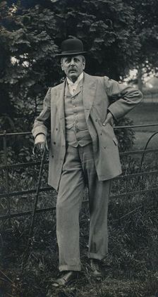 A gentleman wearing a suit and bowler hat c1910