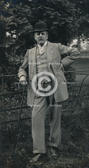 A gentleman wearing a suit and bowler hat c1910. Artist: Unknown