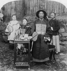 A genial official of interior China, naval mandarin, Kinkow (Jingzhou), China, 1900. Artist: Underwood & Underwood