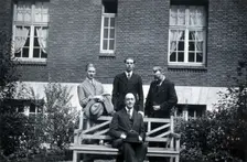 A George, L Destoucher, R Valletto and de Broglie, in front of the Institut Henri Poincaré, 1933. Creator: Unknown