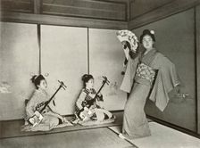 A Geisha Dancing 1910. Creator: Herbert Ponting