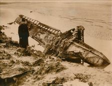 A German aircraft shot down on the English coast, c1939-c1945. Creator: Unknown