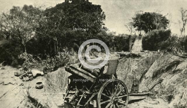 'A German Gun Position in the Heart of the Jungle: one of the 4.1 howitzers captured in East Africa' Creator: Unknown.