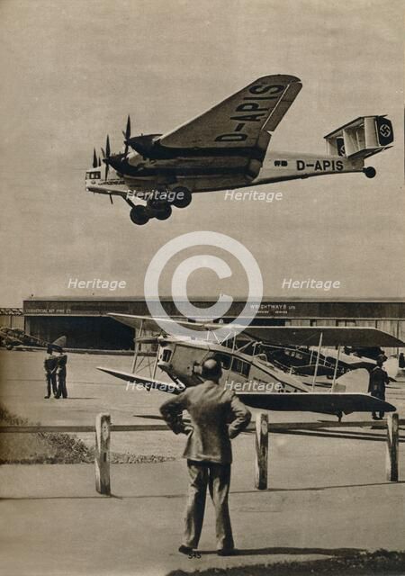 A German Junkers airliner arriving at Croydon Airport, c1934 (c1937). Artist: Unknown.