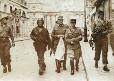 A German officer escorted by French soldiers, the liberation of Paris, World War II, 1944. Creator: Unknown