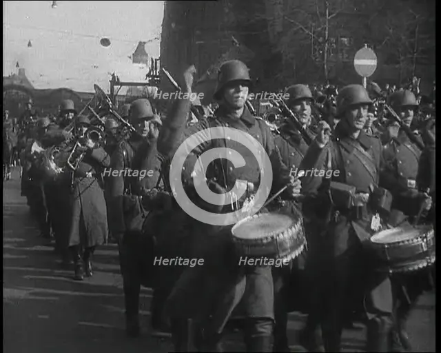 A German Military Band Marching Through the Rhineland, 1936. Creator: British Pathe Ltd.