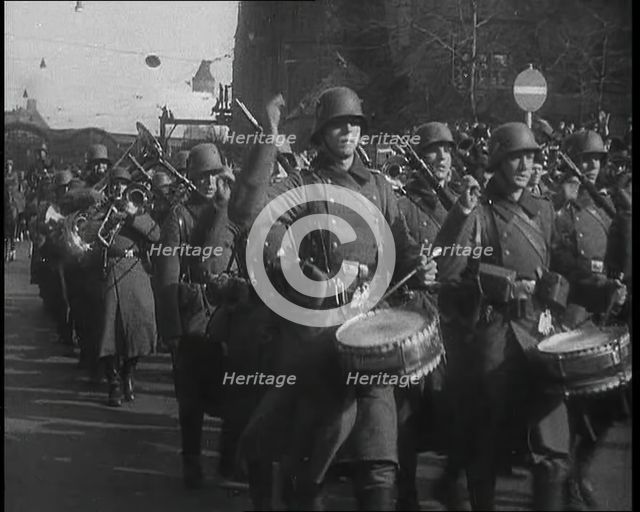 A German Military Band Marching Through the Rhineland, 1936. Creator: British Pathe Ltd.