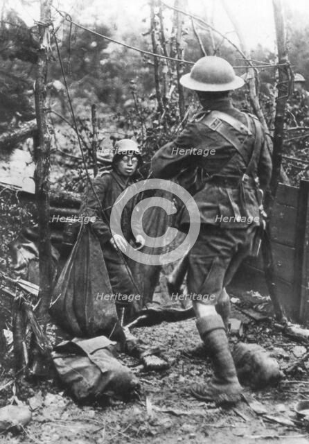 A German soldier surrenders, Aisne, France, World War I, 18 July 1918. Artist: Unknown