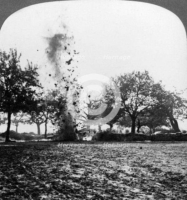 A German shell exploding, World War I, 1914-1918.Artist: Realistic Travels Publishers