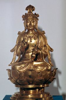 A gilt-bronze statuette of a Bodhisattva on a lotus leaf, 10th century