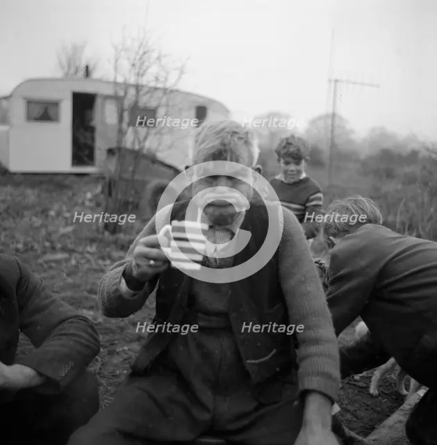 A gipsy man 'gurning', Lewes, Sussex, 1963. 