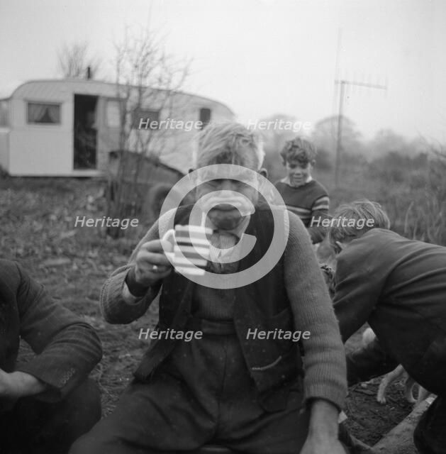 A gipsy man 'gurning', Lewes, Sussex, 1963. 