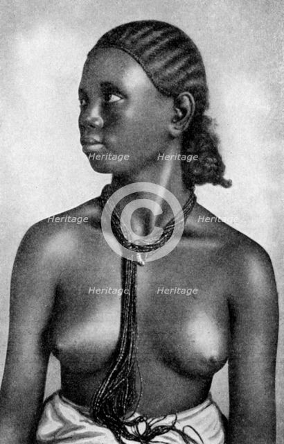 A girl of the Tigre people, Africa, 1922. Artist: Unknown