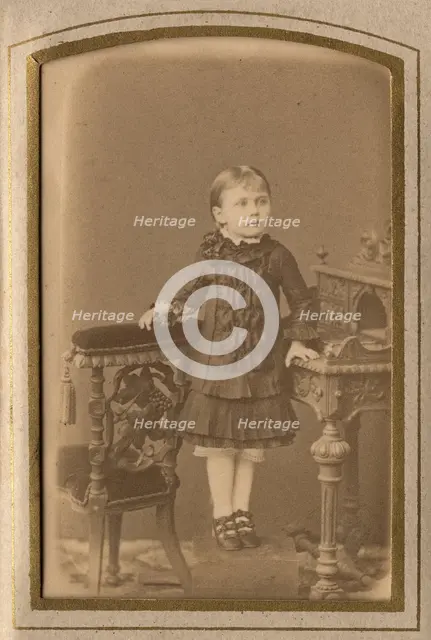 A girl in a dress and shoes, late 19th cent - early 20th cent. Creator: PA Milevskii.
