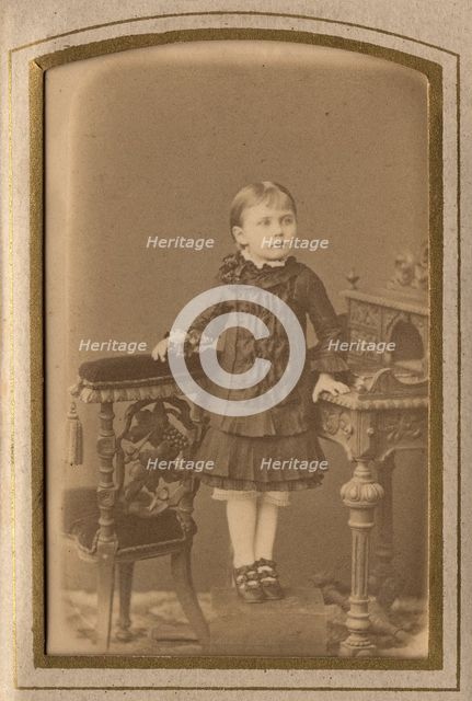 A girl in a dress and shoes, late 19th cent - early 20th cent. Creator: PA Milevskii.
