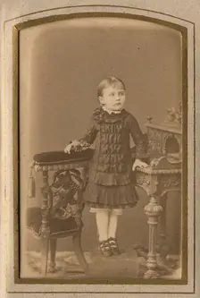 A girl in a dress and shoes, late 19th cent - early 20th cent. Creator: PA Milevskii