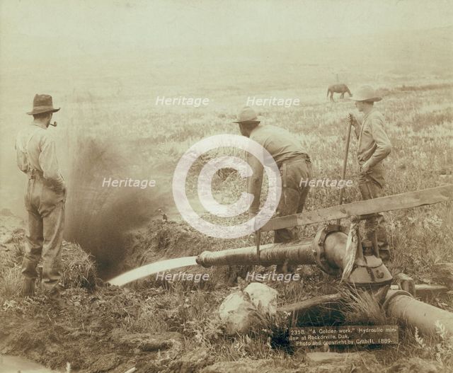 A Golden work Hydroulic [sic] mining at Rockdrville [ie Rockerville], Dak, 1889. Creator: John C. H. Grabill.