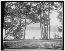 A glimpse of Mirror Lake, Adirondack Mountains, c1902. Creator: William H. Jackson
