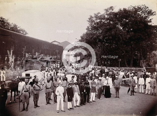 A group comprising doctors, health and public officials gathered on a street in Bombay..., 1896/1897 Creator: Unknown.