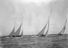 A group of 12 Metres sailing yachts racing on windward leg in good wind, 1933. Creator: Kirk & Sons of Cowes