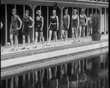 A Group of Young Female Civilians Wearing Short Swimsuits and Heeled Shoes Emerging from..., 1920. Creator: British Pathe Ltd