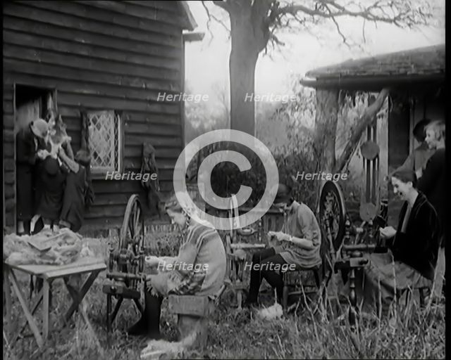 A Group of Young Girls Being Taught To Spin and Weave, 1931. Creator: British Pathe Ltd.