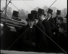 A Group of Young Male British Civilians Admiring an Airplane On an Airfield, 1920s. Creator: British Pathe Ltd
