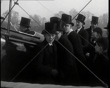 A Group of Young Male British Civilians Admiring an Airplane On an Airfield, 1920s. Creator: British Pathe Ltd