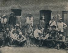 A Group of Afrikaners and Zulus c1900. Creator: Unknown